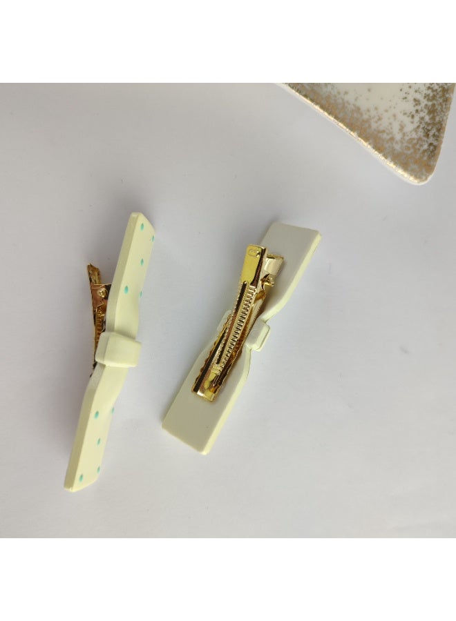عرض 2 توكة شعر كلبس شكل فيونكات أنيقة – تصميم أنثوي وثبات مريح - Image 4